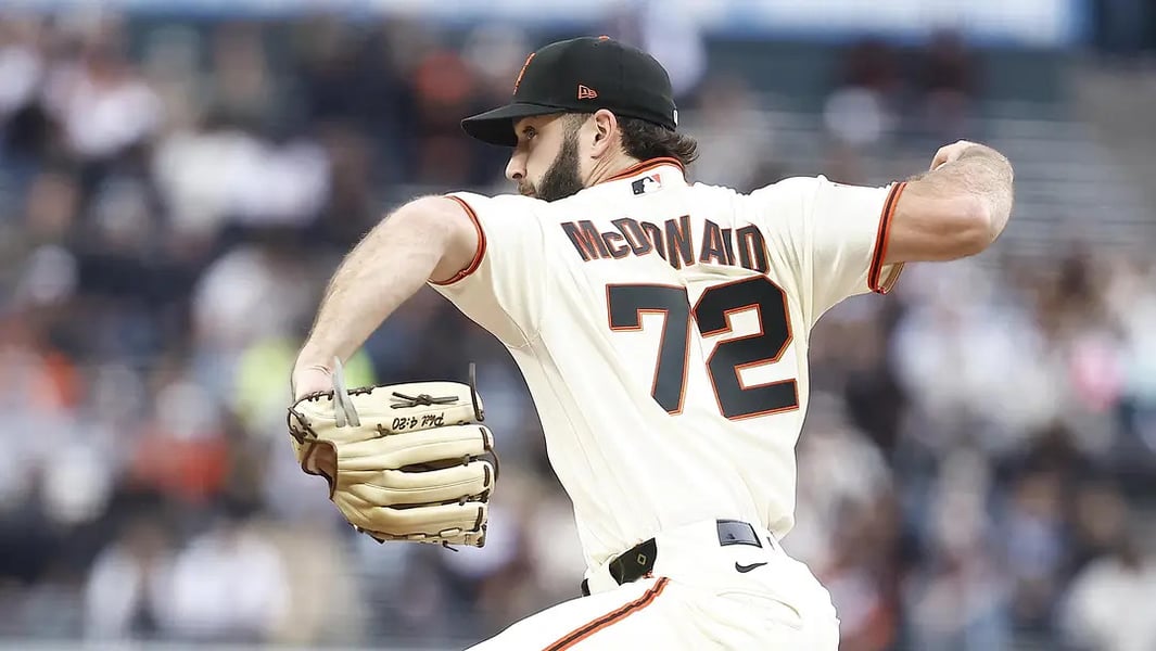 Trevor McDonald pitching for San Francisco Giants during MLB game against White Sox