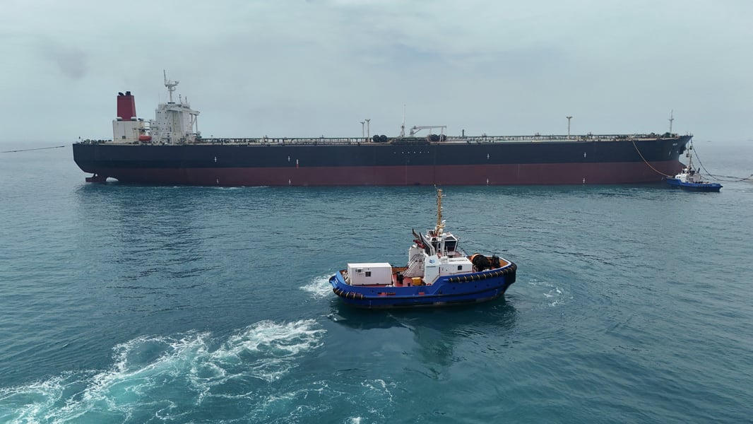 Oil tankers and naval ships in Strait of Hormuz during US Iran crisis 2026