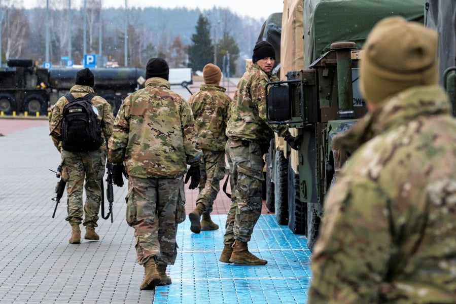 US armored troops during halted military deployment to Poland amid NATO tensions