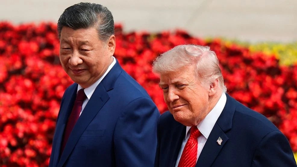 Donald Trump and Xi Jinping during talks as US freezes Taiwan arms deal