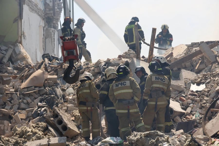 Russian rescuers search rubble after Ukrainian drone strike on Starobelsk college in LPR