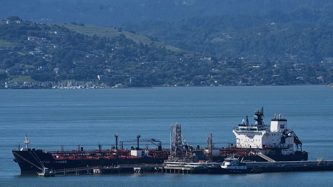 Oil tankers transit through the Strait of Hormuz amid rising US-Iran tensions and global energy market fears
