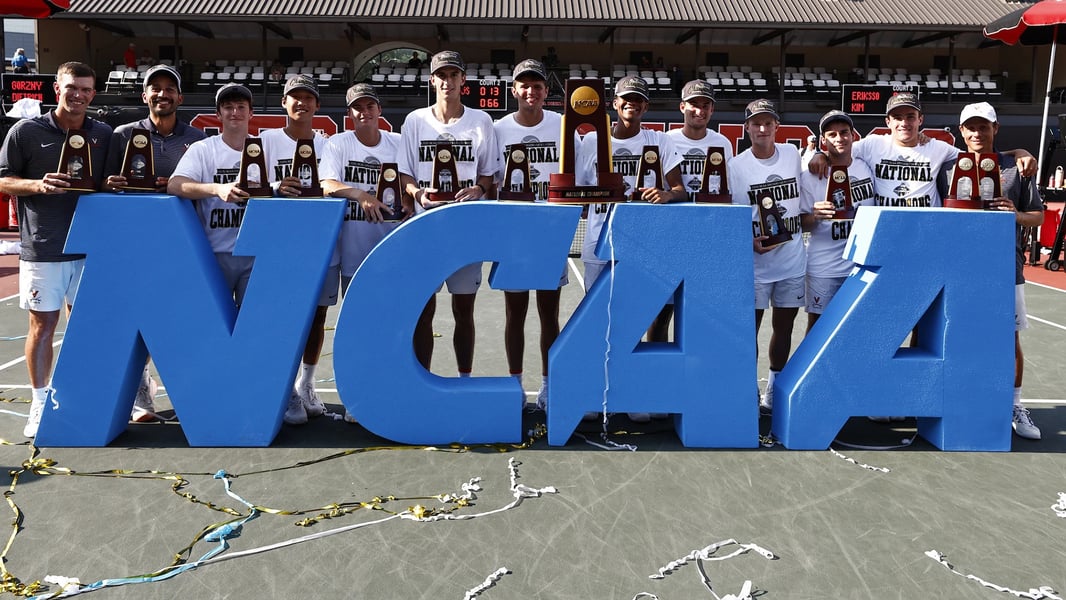 Dylan Dietrich celebrates after clinching Virginia’s NCAA men’s tennis championship victory over Texas