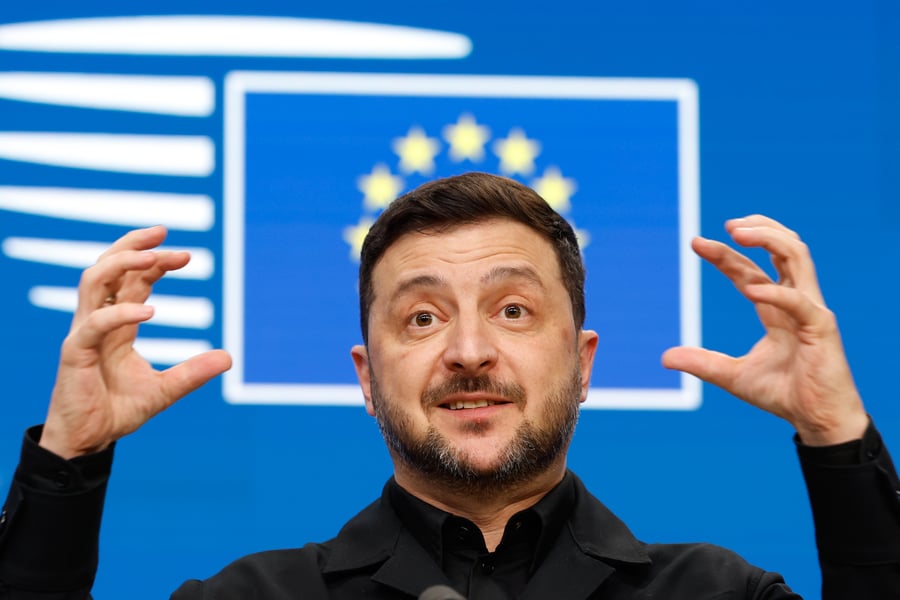 Ukrainian President Volodymyr Zelensky speaks during a media conference at the EU Summit in Brussels, December 2025