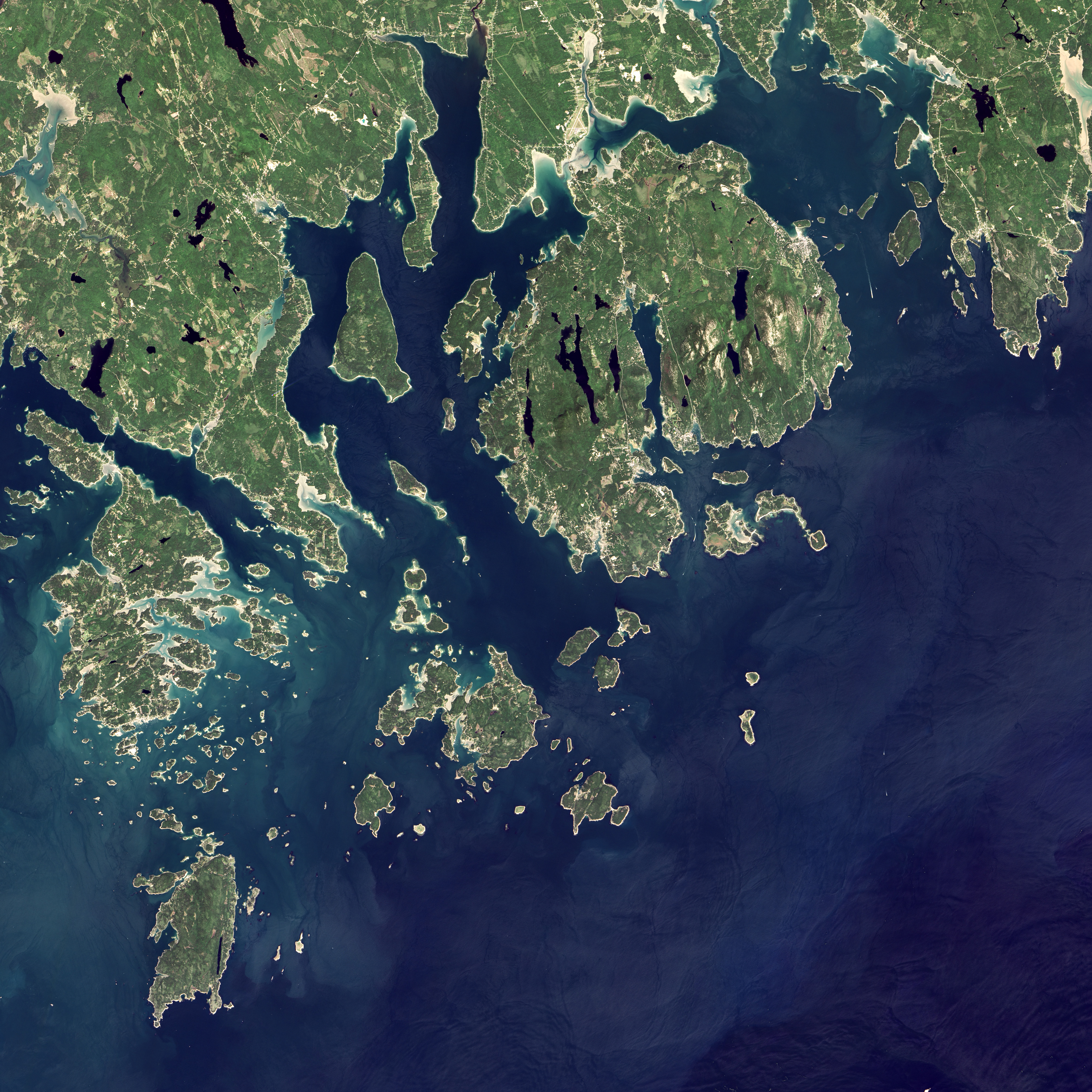 NASA Landsat satellite view of Acadia National Park in Maine, where climate-change signage was removed under a Trump executive order and ordered restored