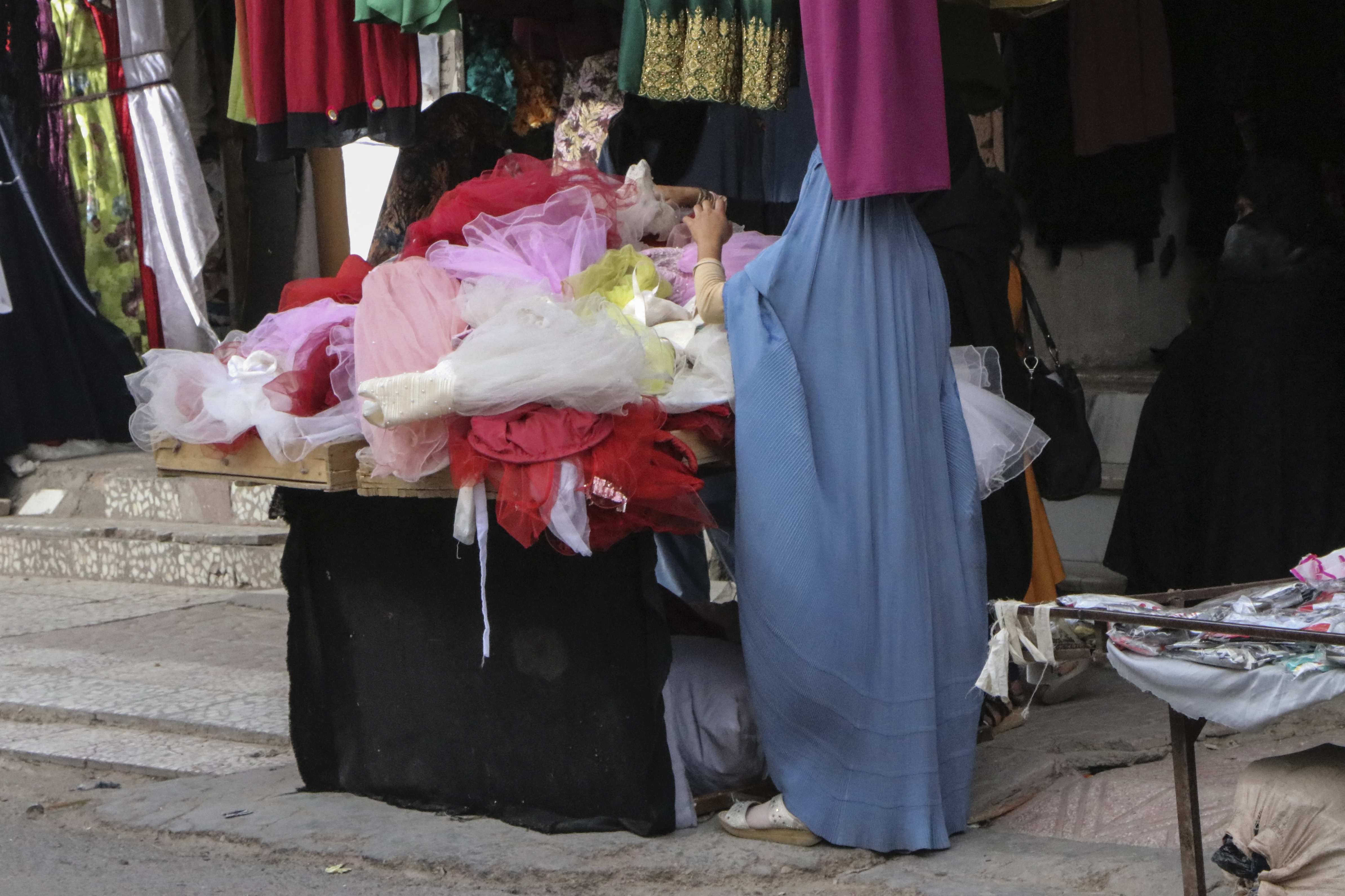 A burqa-clad woman in Herat as Taliban enforces mandatory dress code for women in Afghanistan