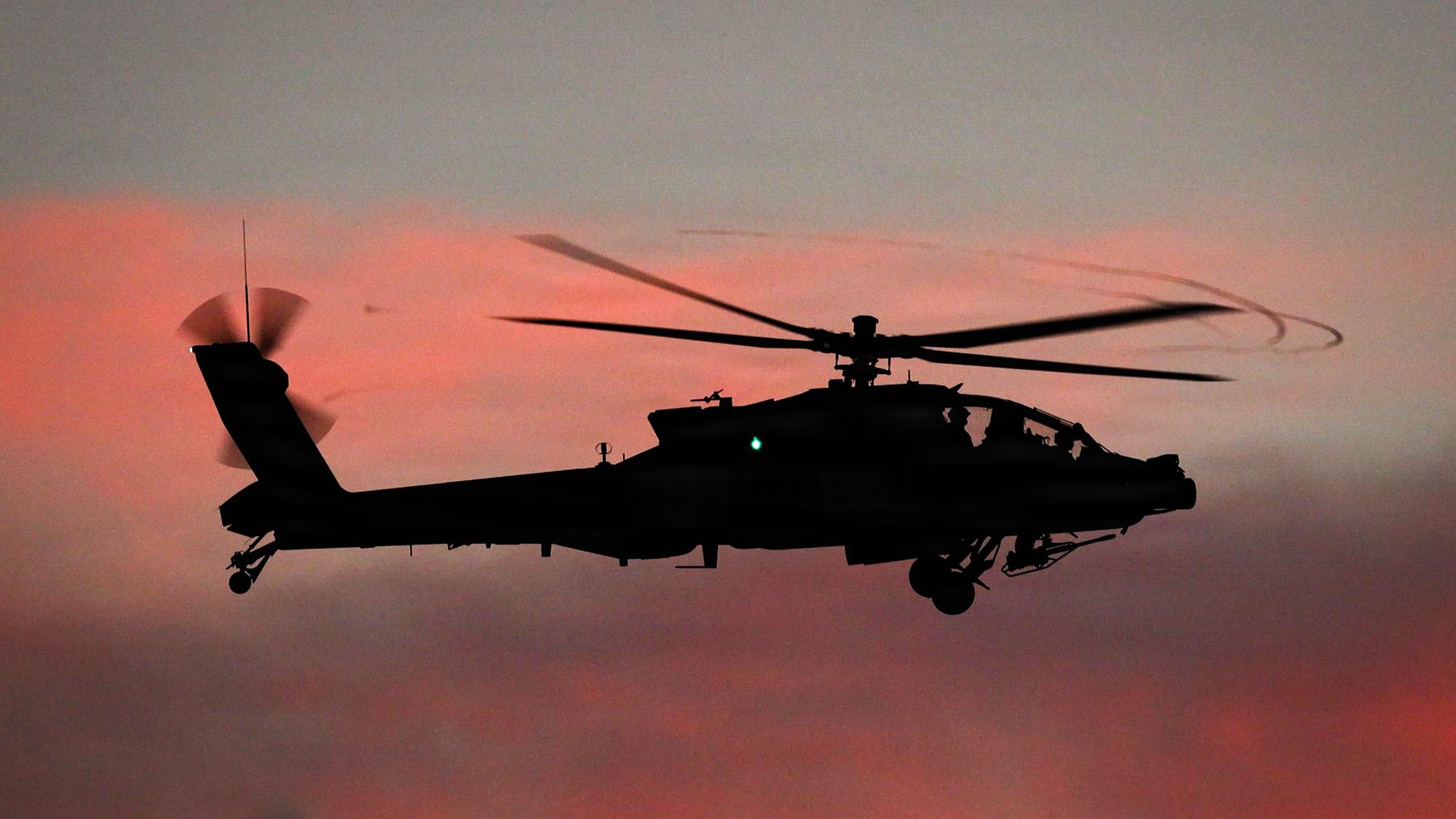An AH-64 Apache helicopter assigned to 2nd Squadron 6th Cavalry Regiment during an aerial gunnery exercise February 2026