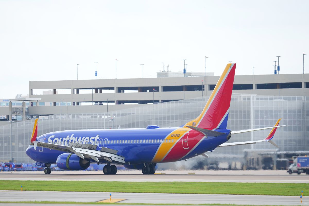 A passenger jet on approach as global airlines face a 70 percent jet fuel cost surge in 2026