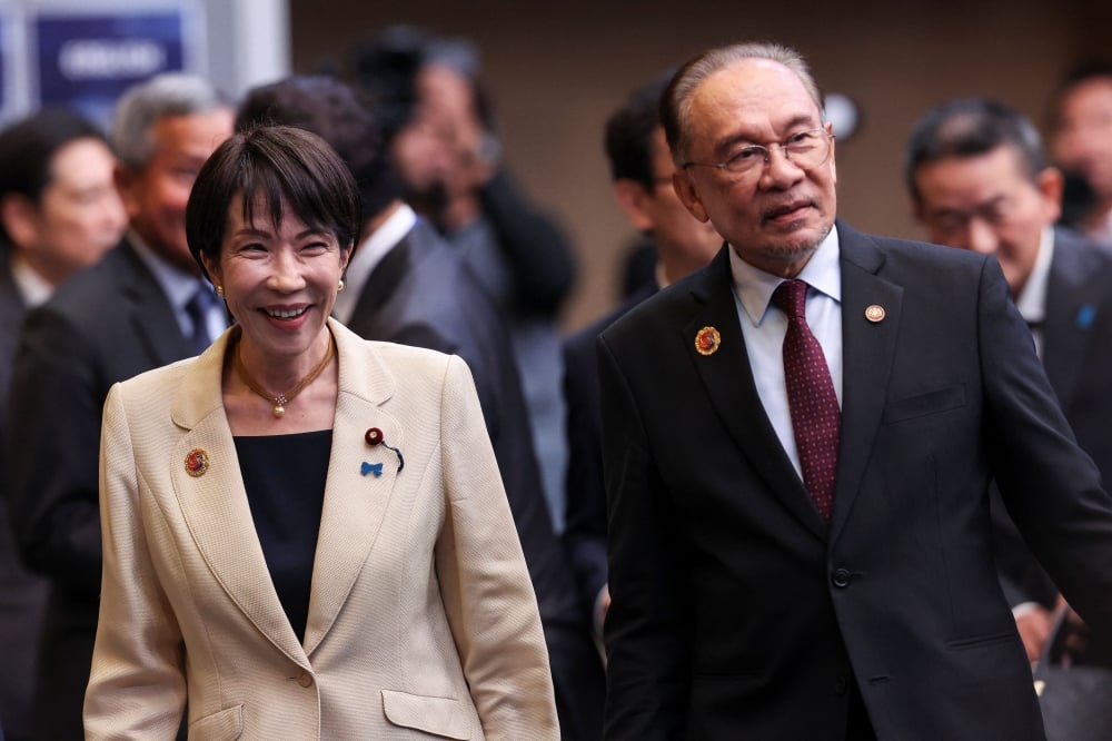 Anwar Ibrahim and Sanae Takaichi at ASEAN Summit Kuala Lumpur 2025