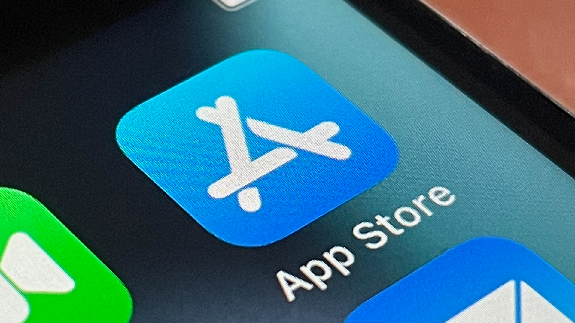 App Store icon on iPhone screen representing Apple new cross-developer subscription bundles announced at WWDC 2026