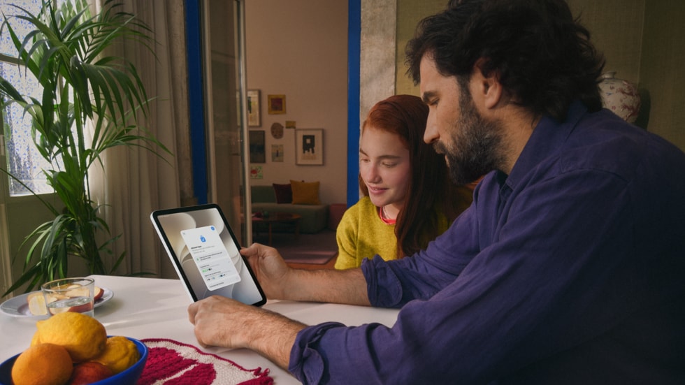Parent and child using iPad together showing Apple iOS 27 Ask to Browse parental controls