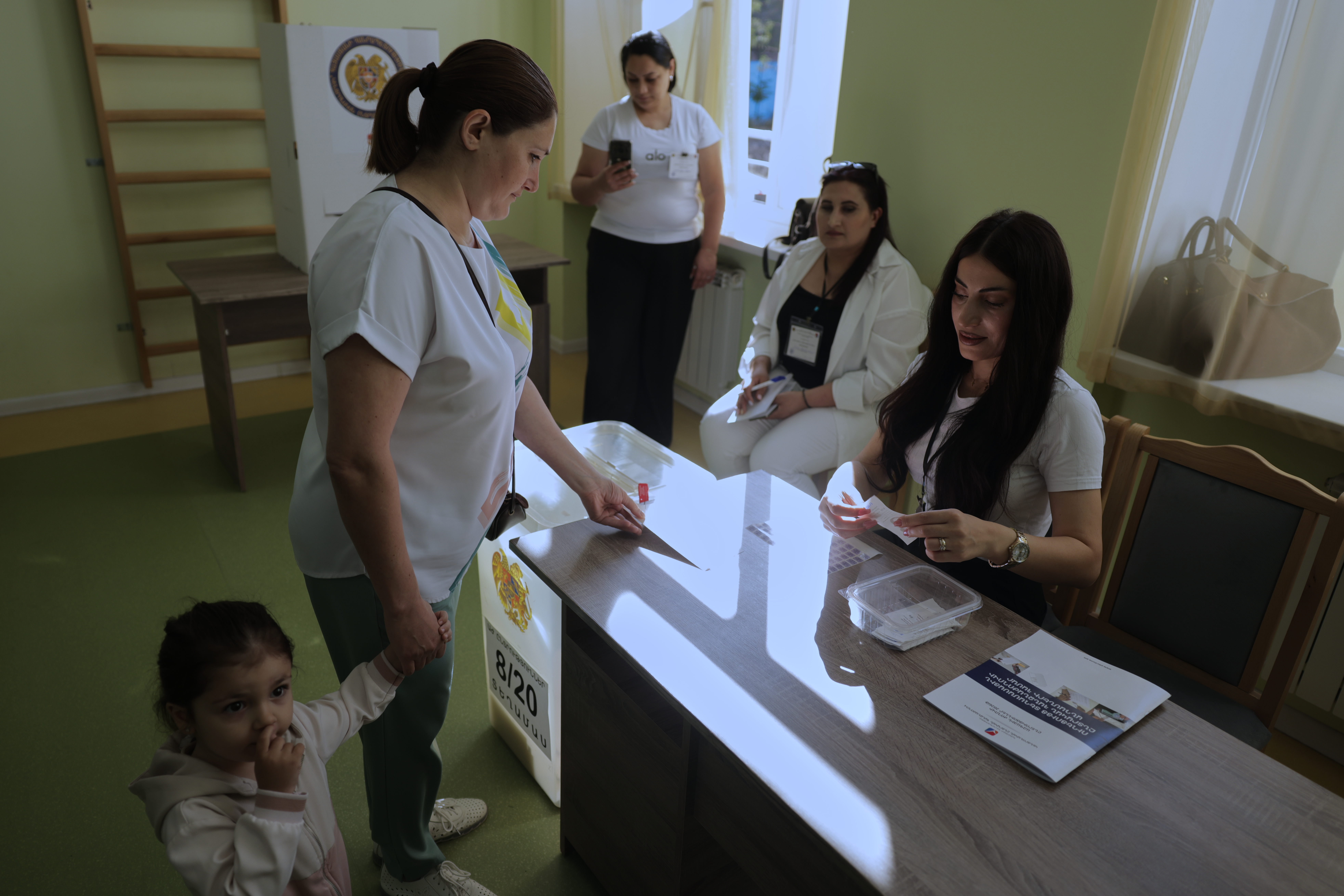 Voters cast ballots at a polling station in Yerevan during Armenia's parliamentary election on June 7 2026