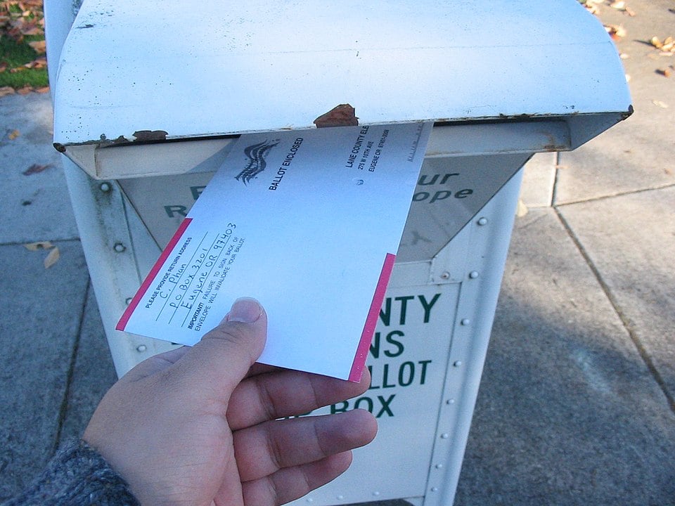 An official ballot return drop box where voters can deposit mail-in ballots, central to the Trump executive order blocked by Judge Talwani