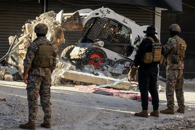 Heavy machinery removes rubble after Israeli airstrike on Beirut southern suburbs June 2026