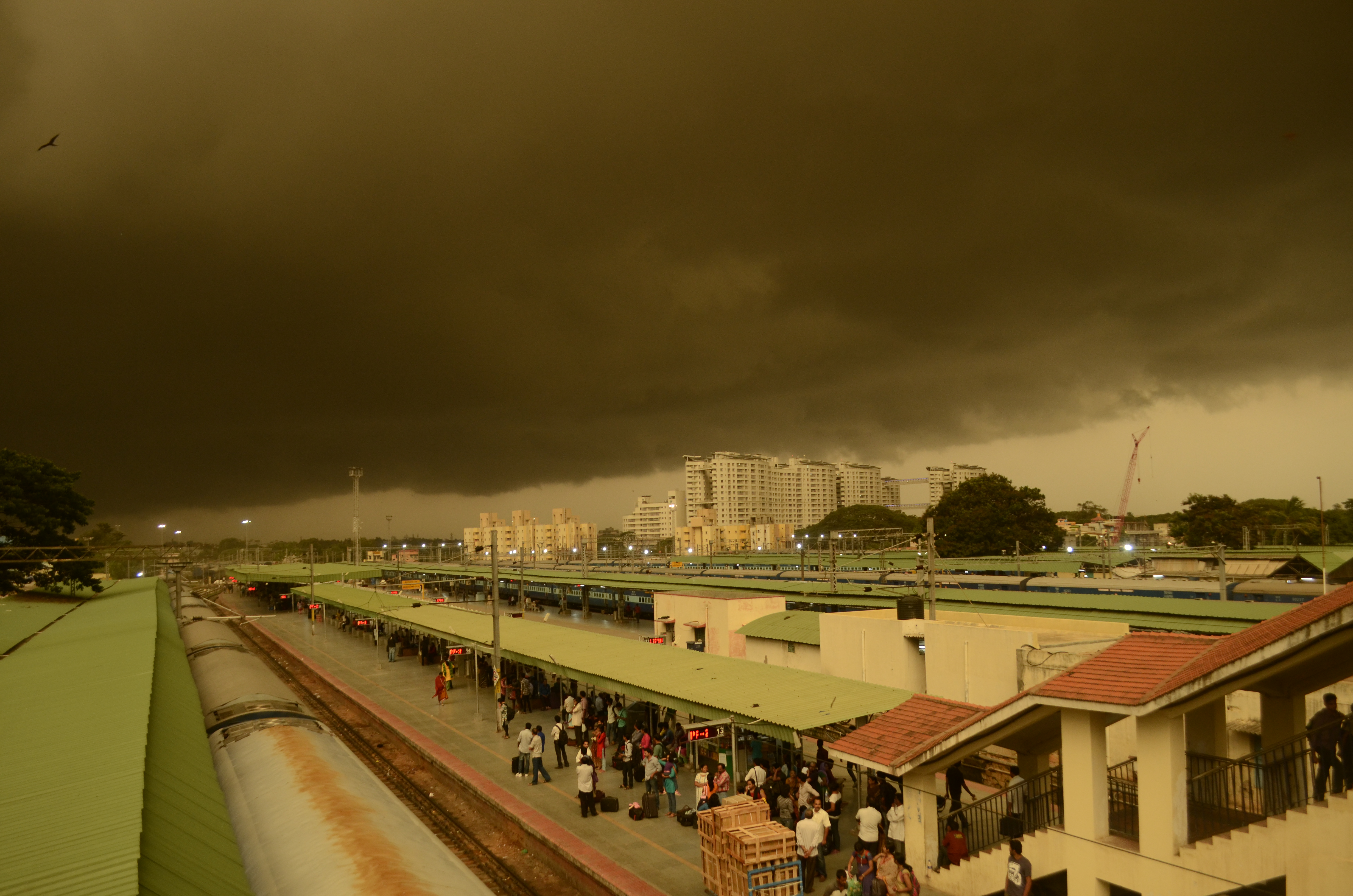 Dark monsoon rain clouds gathering over Bengaluru City railway station as the IMD issues a red alert