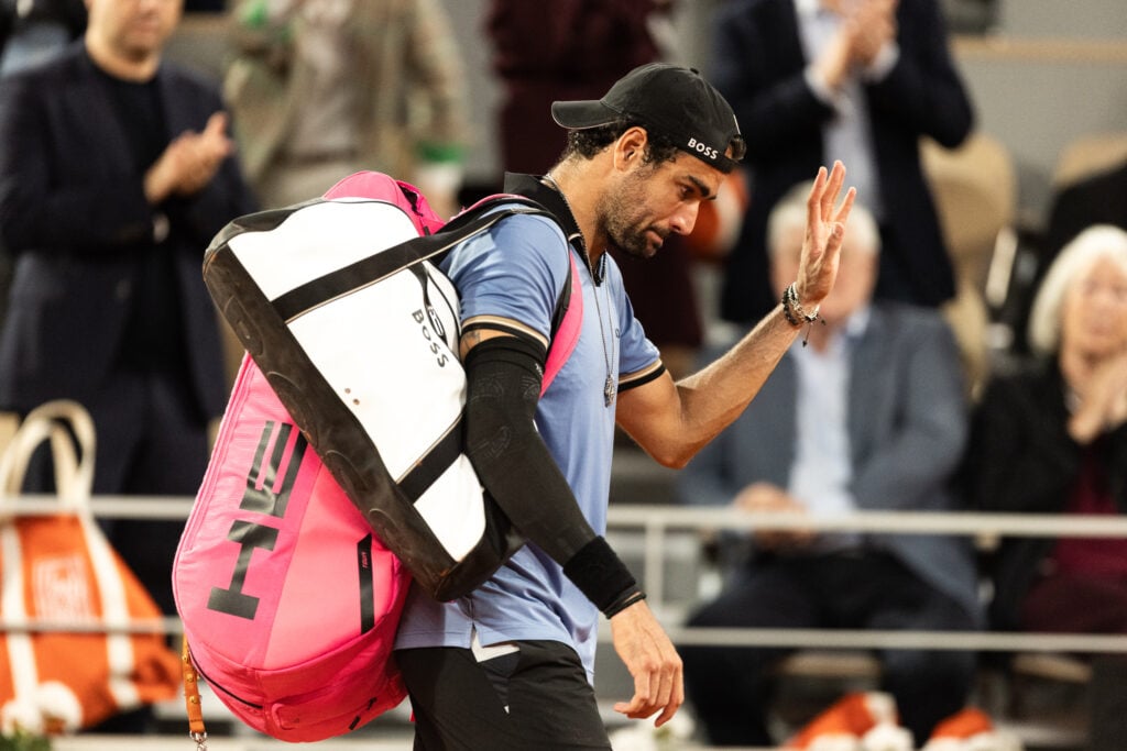 Matteo Berrettini waves to the crowd at Roland Garros 2026 after his quarterfinal retirement