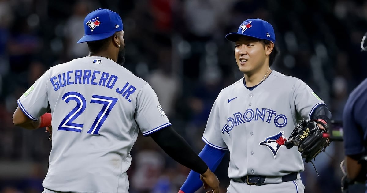 Vladimir Guerrero Jr. celebrates with Kazuma Okamoto after the Blue Jays defeated the Atlanta Braves in Atlanta, June 4, 2026