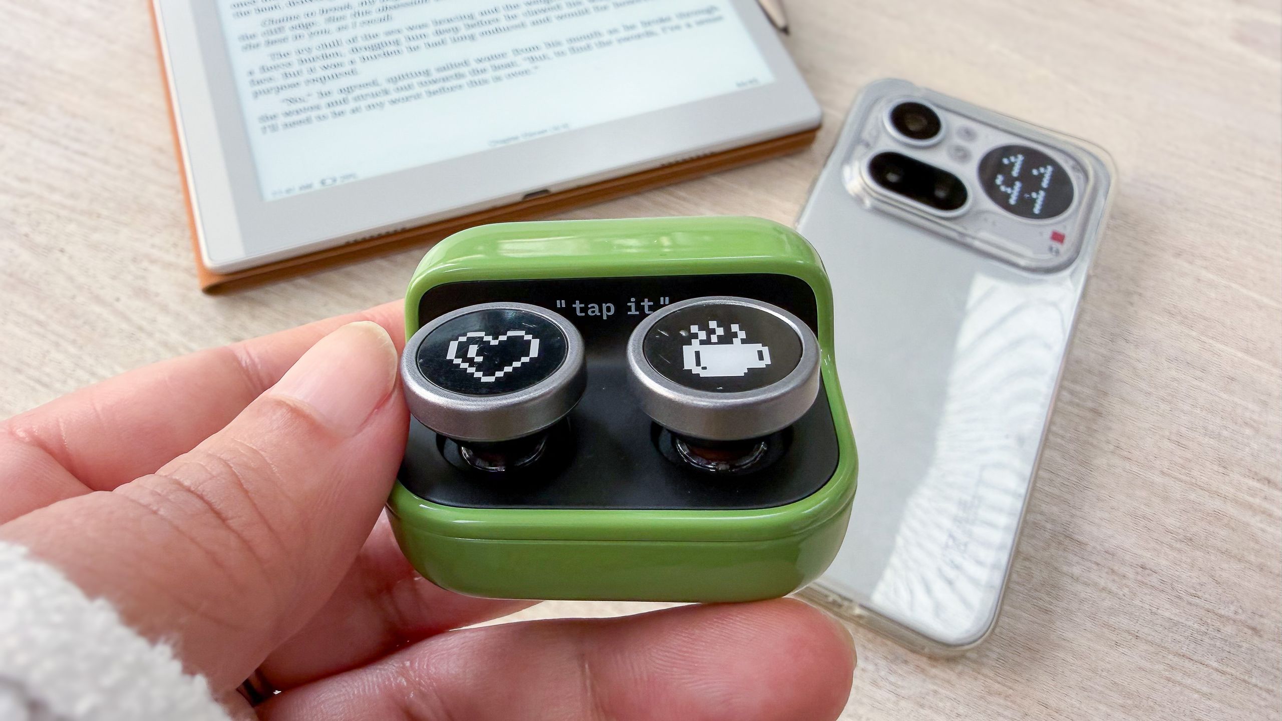 Boox Tappy wireless Bluetooth page turner held in a person's hand