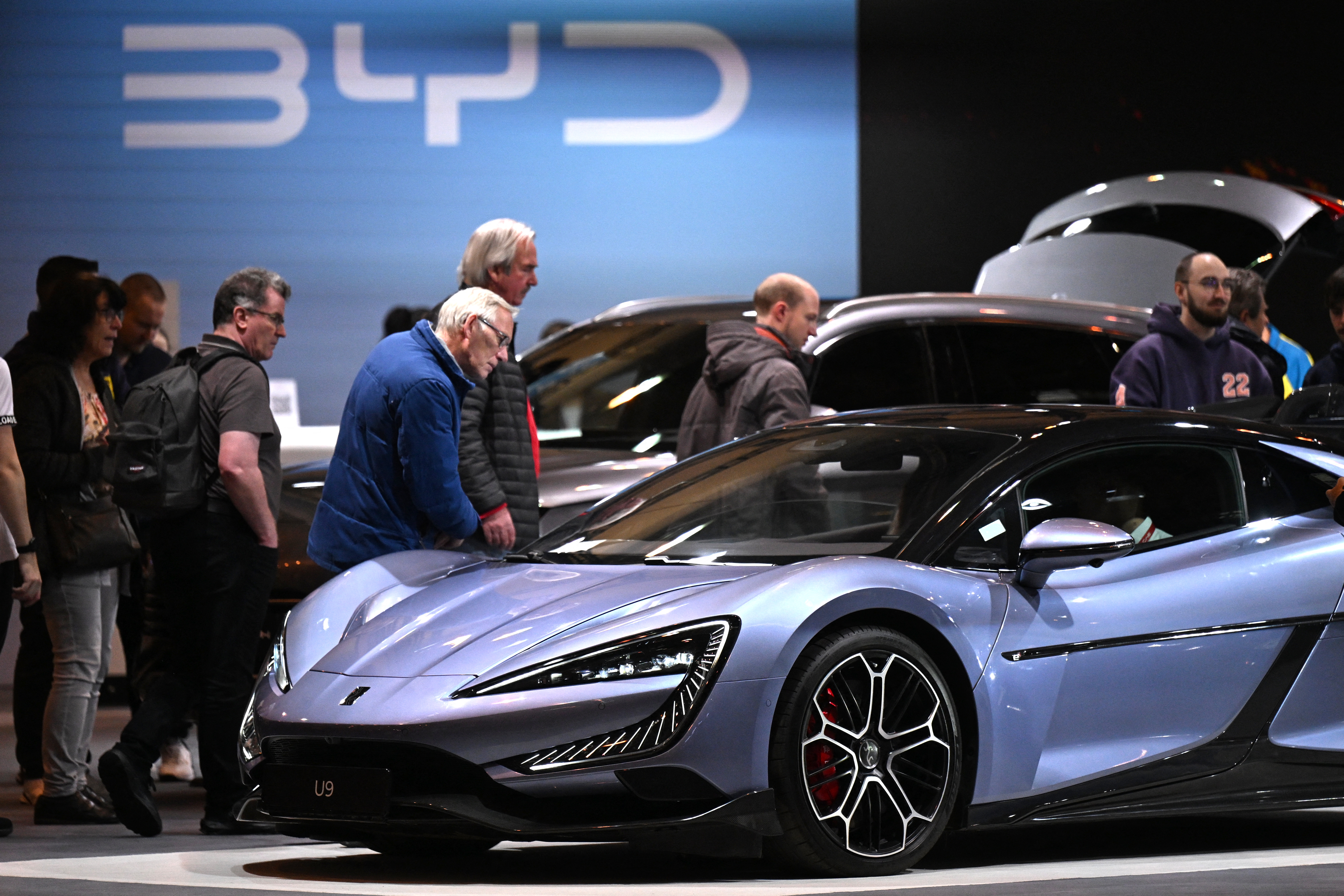 Chinese carmaker BYD displays an electric vehicle model at the Essen Motor Show in Germany