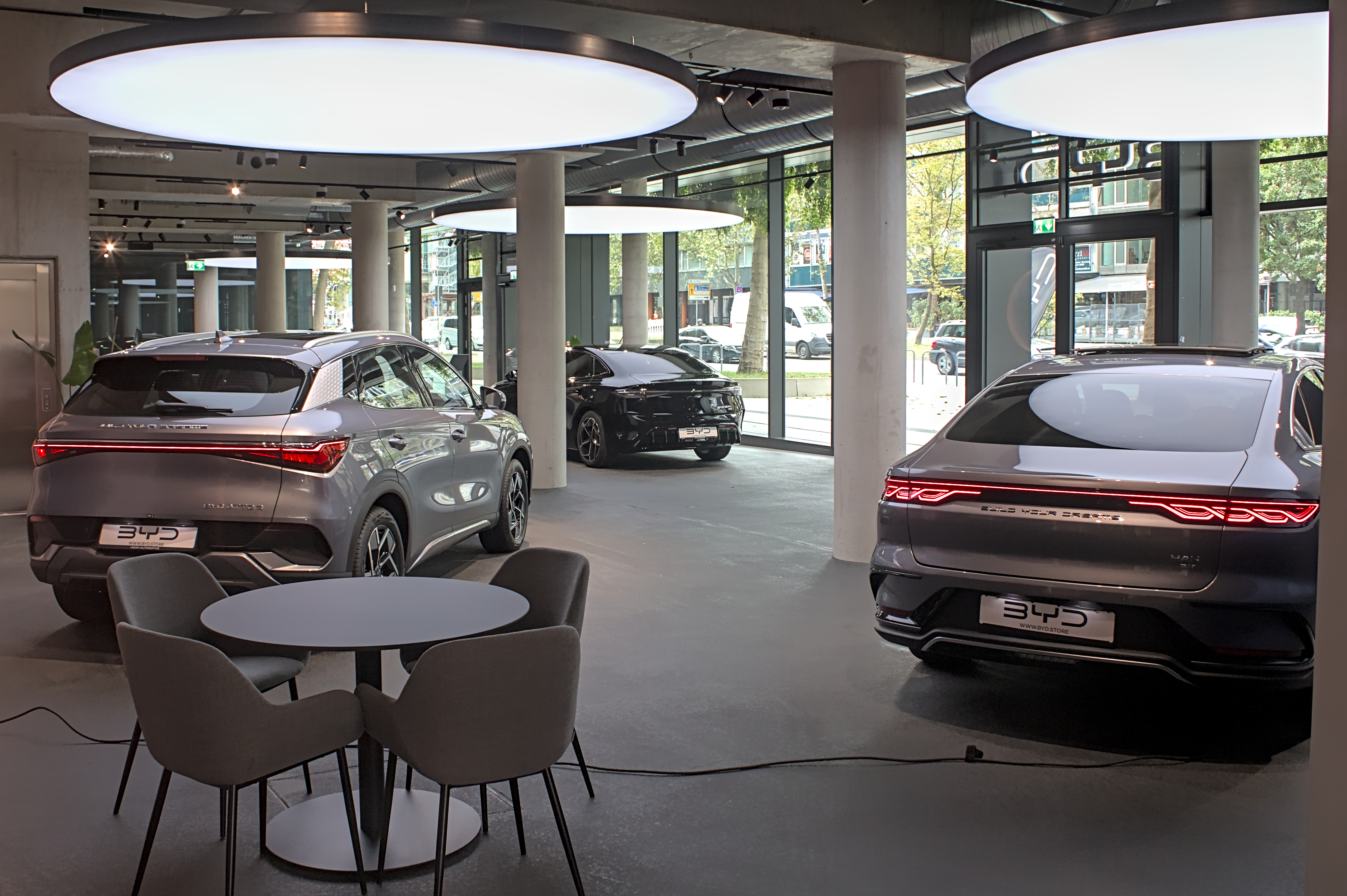 BYD electric vehicle store with cars on display in Stuttgart, Germany