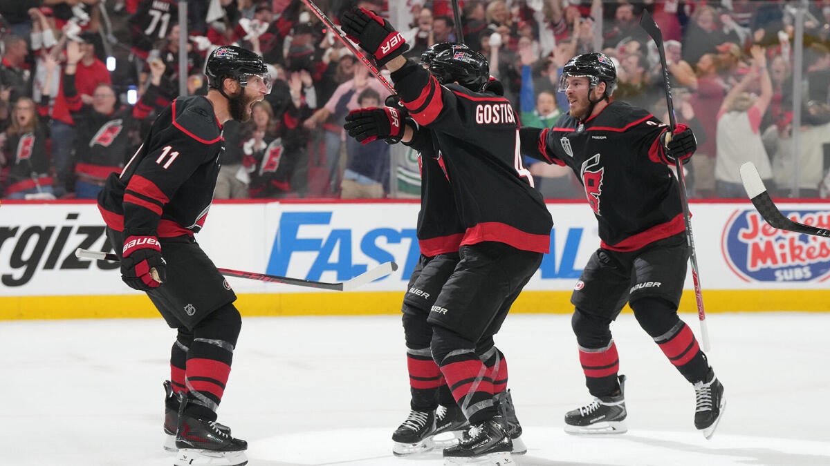 Carolina Hurricanes players celebrate Seth Jarvis overtime goal in Game 2 of 2026 Stanley Cup Final against Vegas Golden Knights