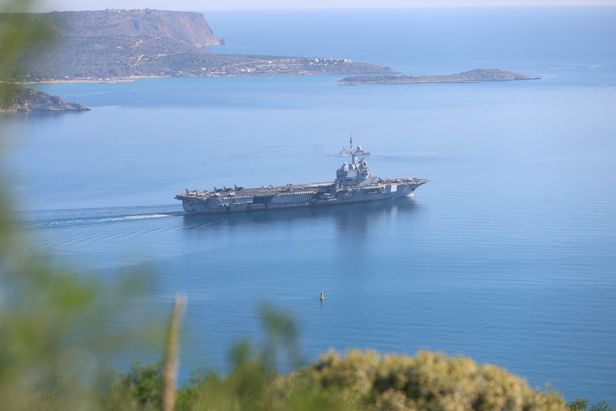 French nuclear aircraft carrier Charles de Gaulle at Souda Bay Crete Greece April 2026 before Arabian Sea Hormuz mission