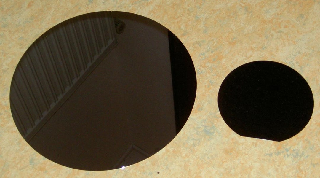 Polished semiconductor wafers, illustrating the China-Infineon gallium nitride chip patent ruling