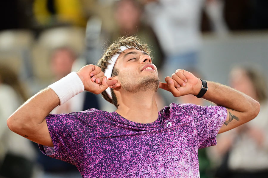 Flavio Cobolli celebrates after defeating Felix Auger-Aliassime at the Roland Garros 2026 quarterfinal