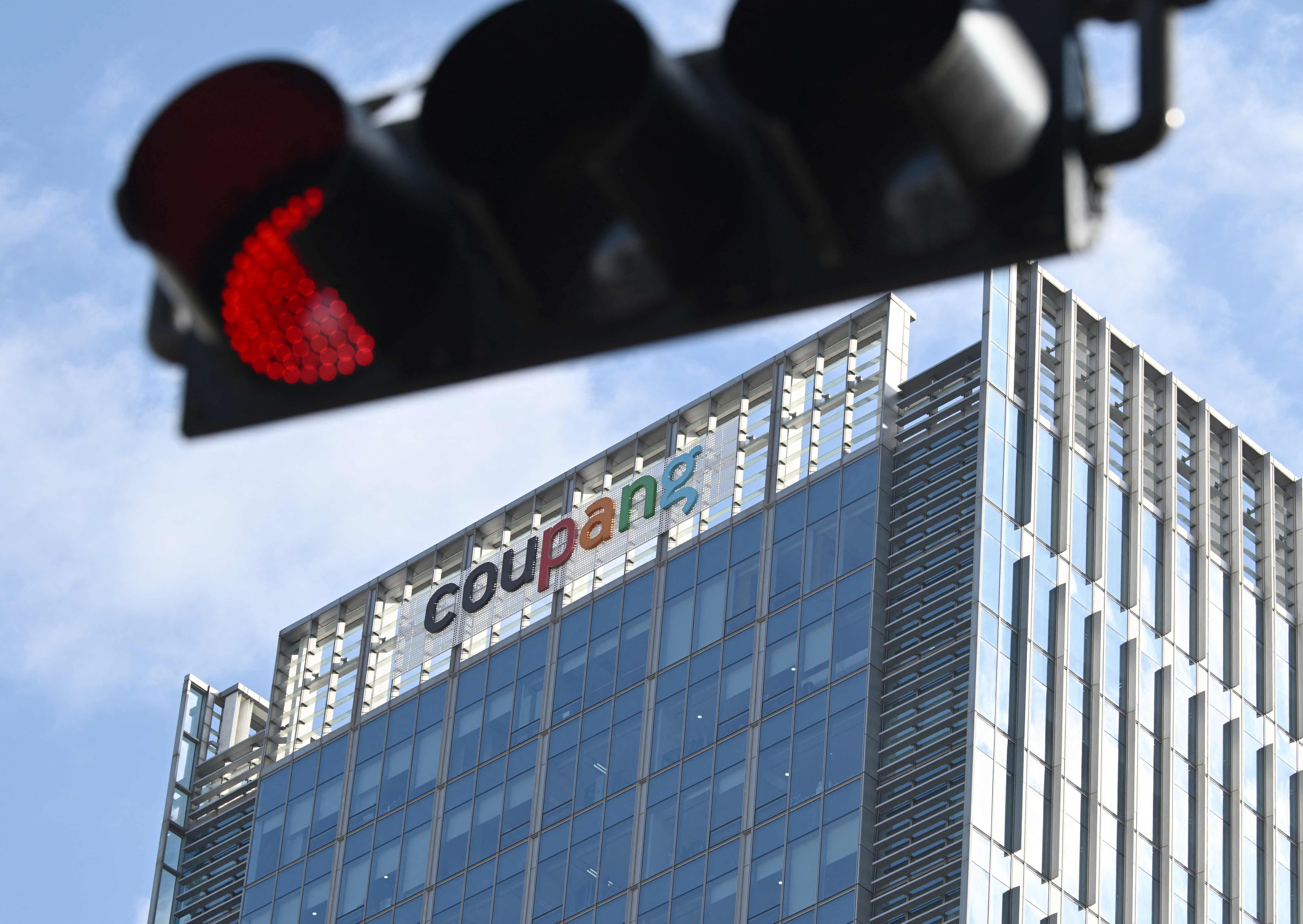 Coupang logo at the company's Seoul headquarters as South Korea hands it a record 409 million dollar data breach fine