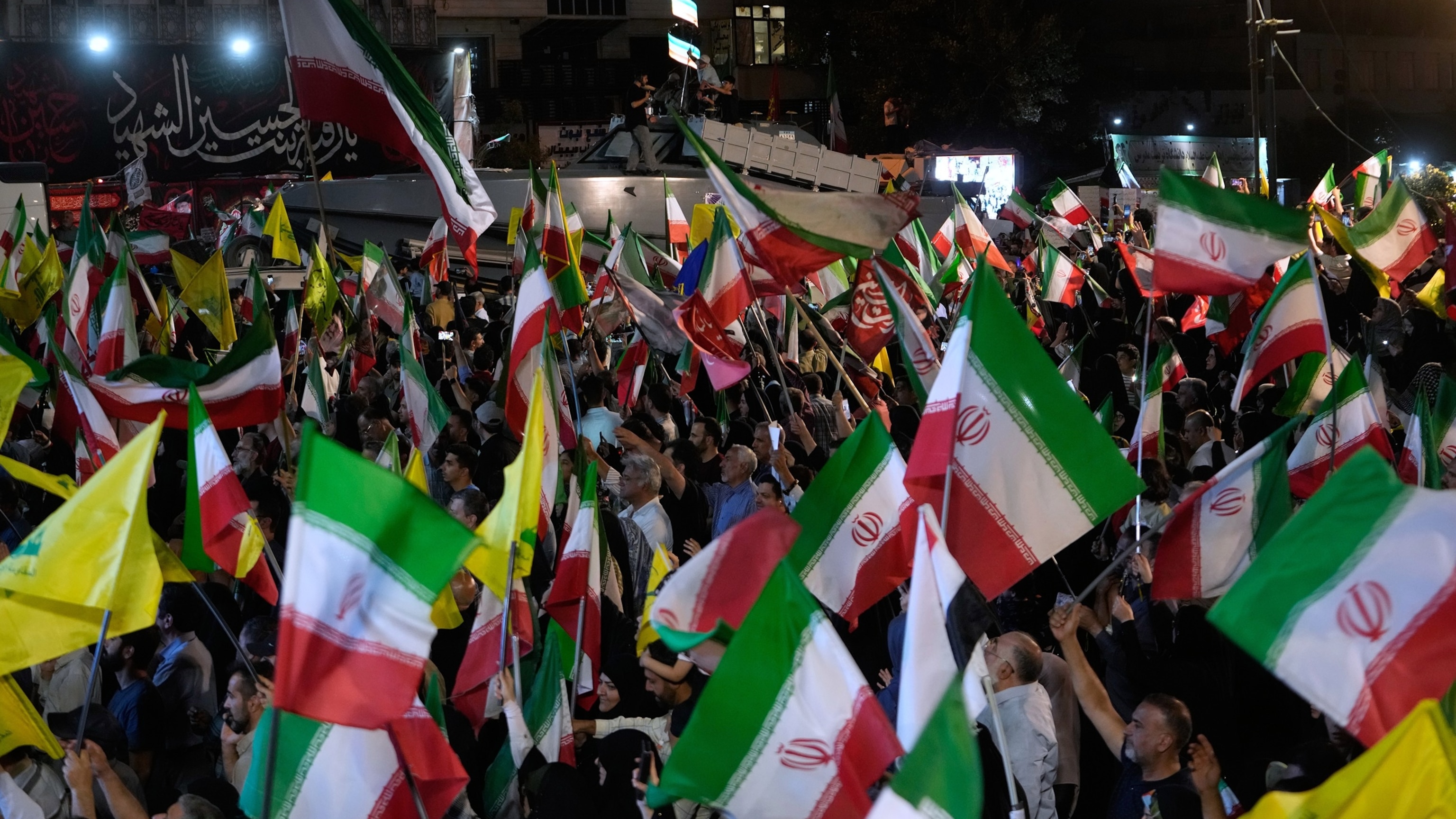 Pro-Iran demonstrators in Tehran as Iran's parliament speaker Ghalibaf warns US bases are legitimate targets after Dahiyeh strike