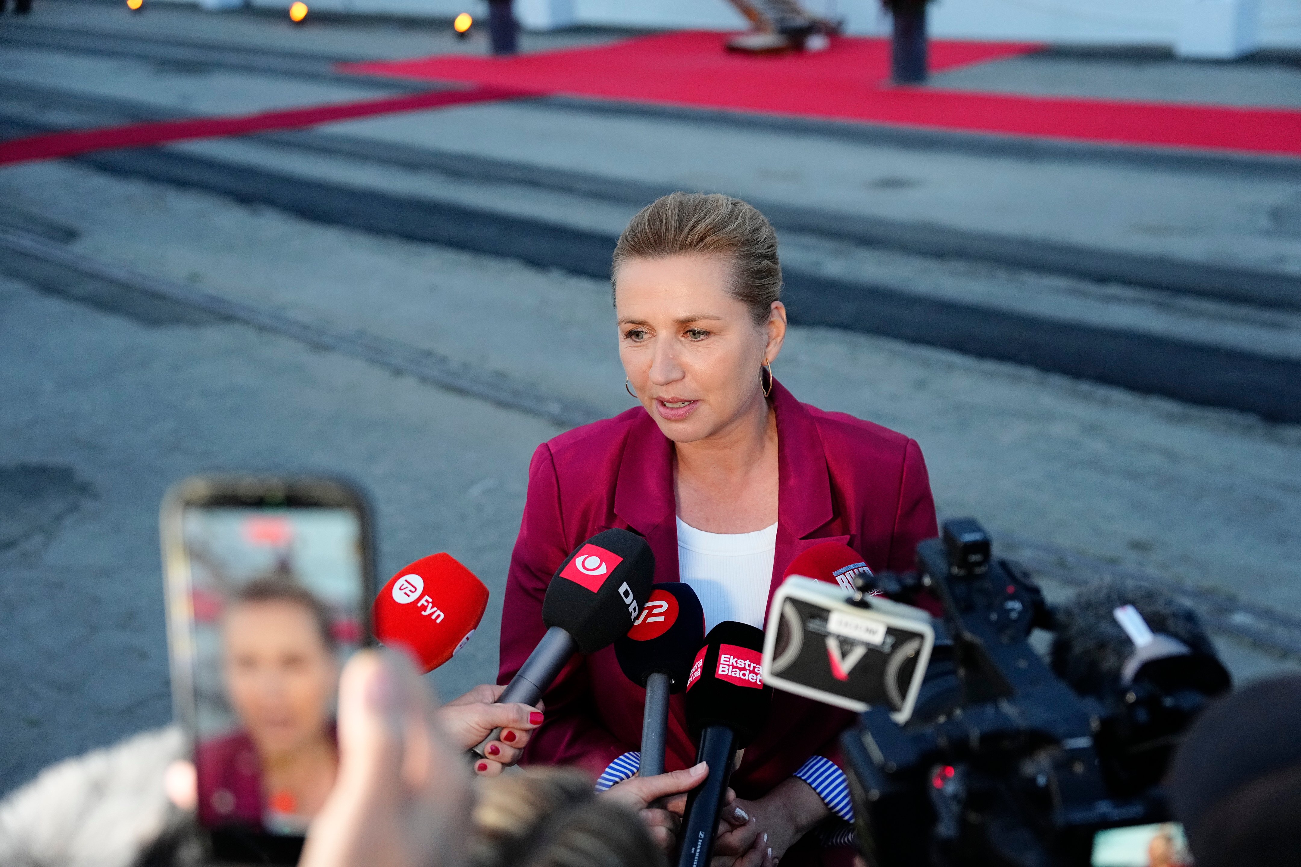 Danish Prime Minister Mette Frederiksen at a reception hosted by King Frederik X after announcing Denmark's new coalition government with plans to expand Greenland's foreign policy role