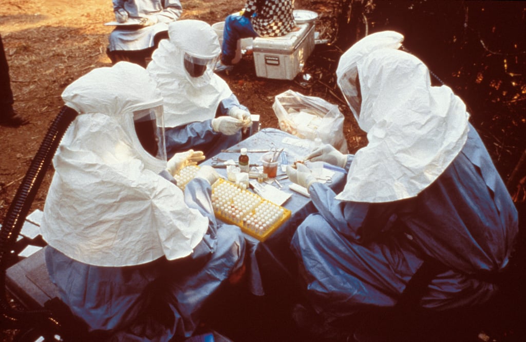 Scientists wearing personal protective equipment during an Ebola outbreak response in DRC