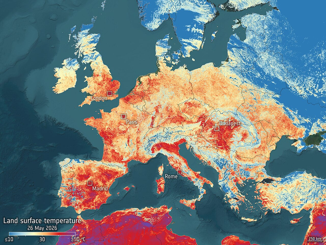 Copernicus Sentinel-3 satellite image showing land surface temperatures across southern Europe during the 2026 heatwave, with red and purple areas indicating temperatures exceeding 50 degrees Celsius