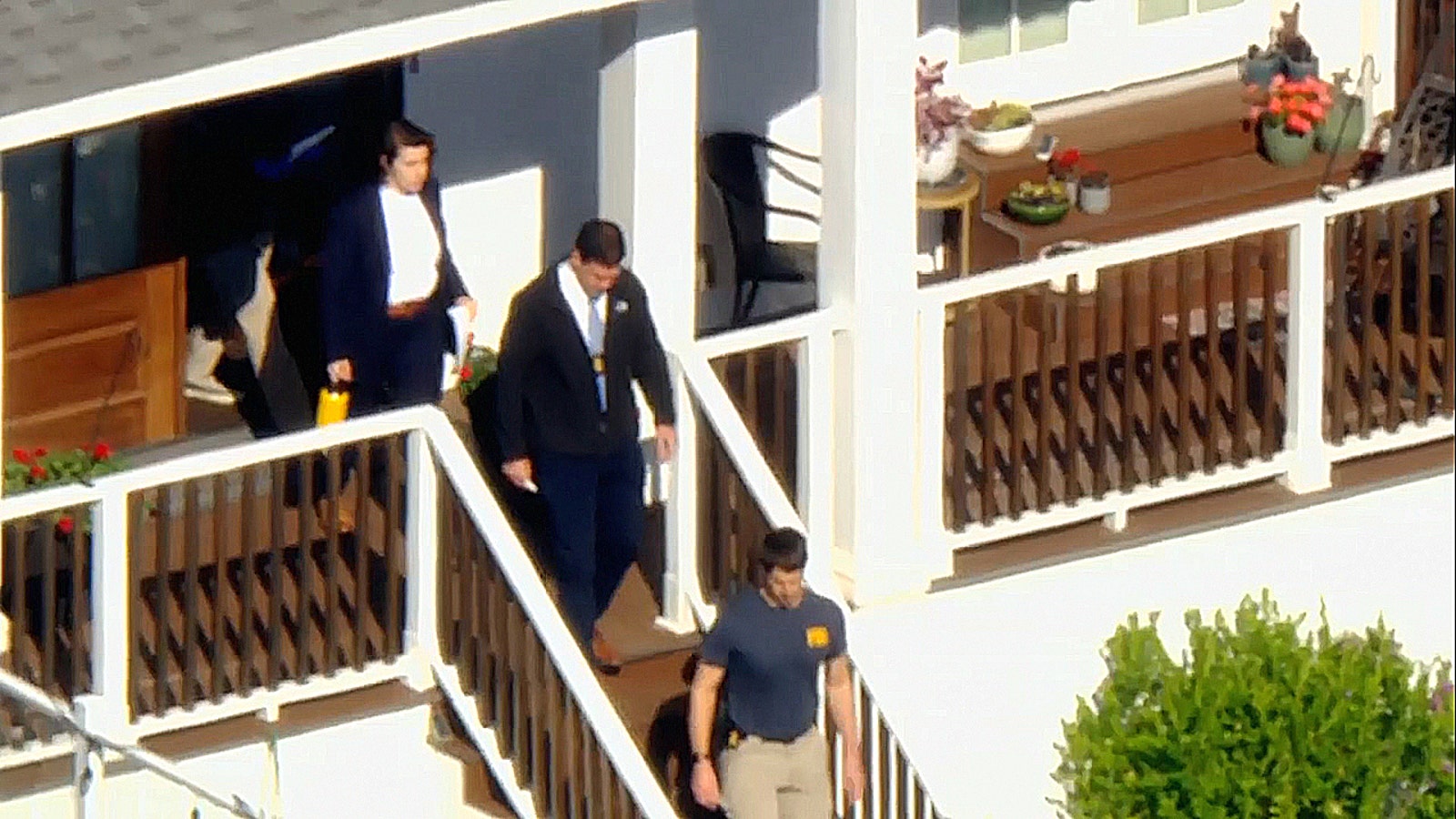 FBI agents serve a federal search warrant during an operation