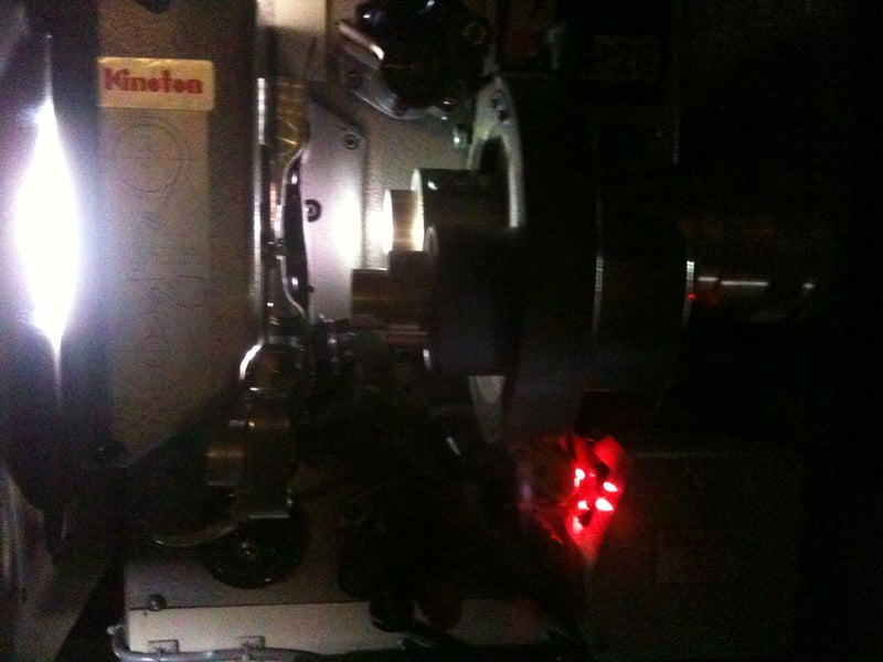 A cinema film projector, illustrating a film festival story