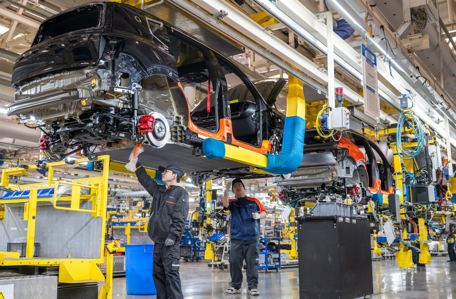 Geely Auto Li Shufu pivots to asset-light overseas strategy with 6.5 million 2030 target as global overcapacity drives Chinese OEM consolidation