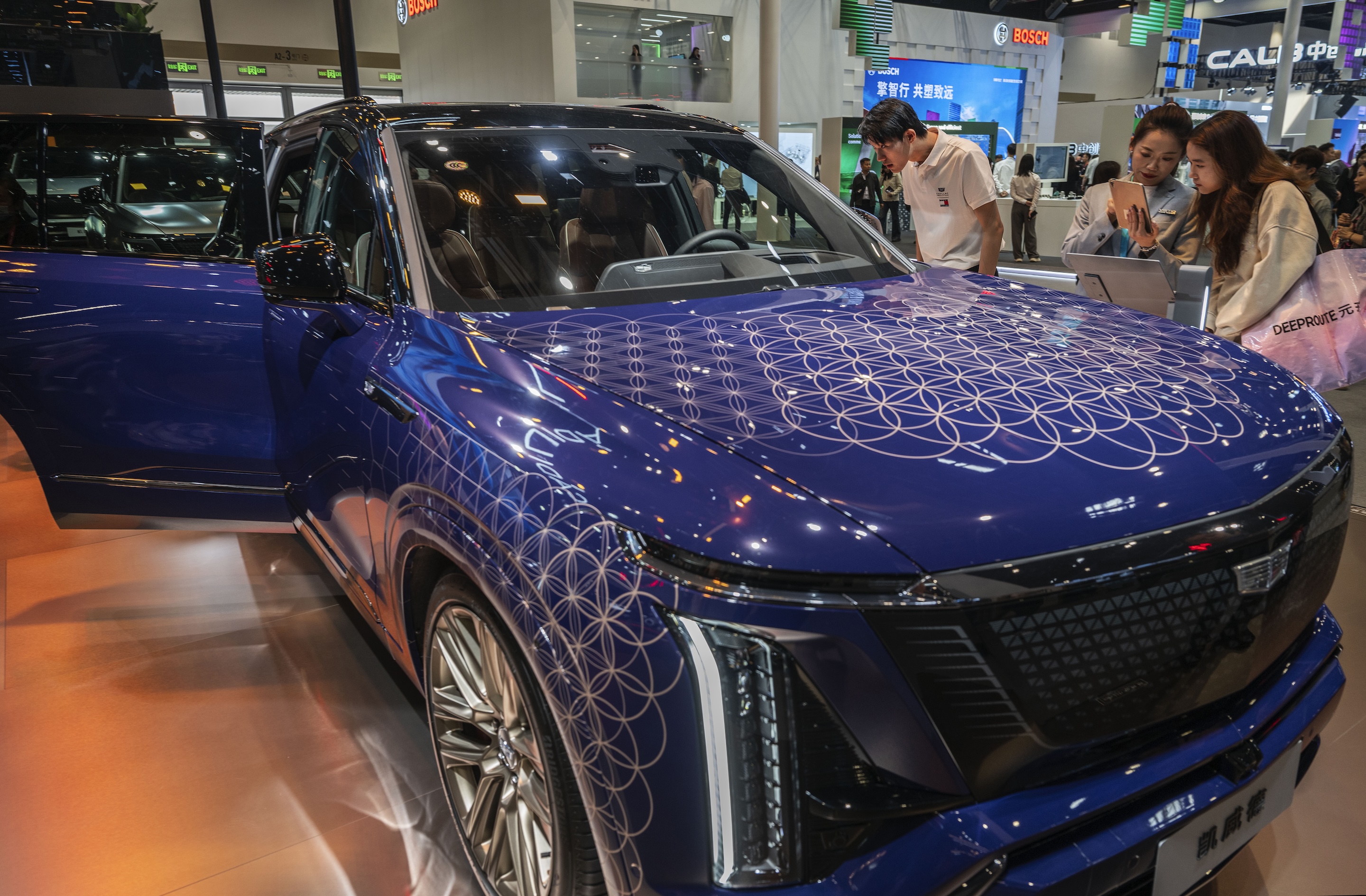 A Cadillac electric vehicle from General Motors on display, as GM pivots battery capacity to grid storage