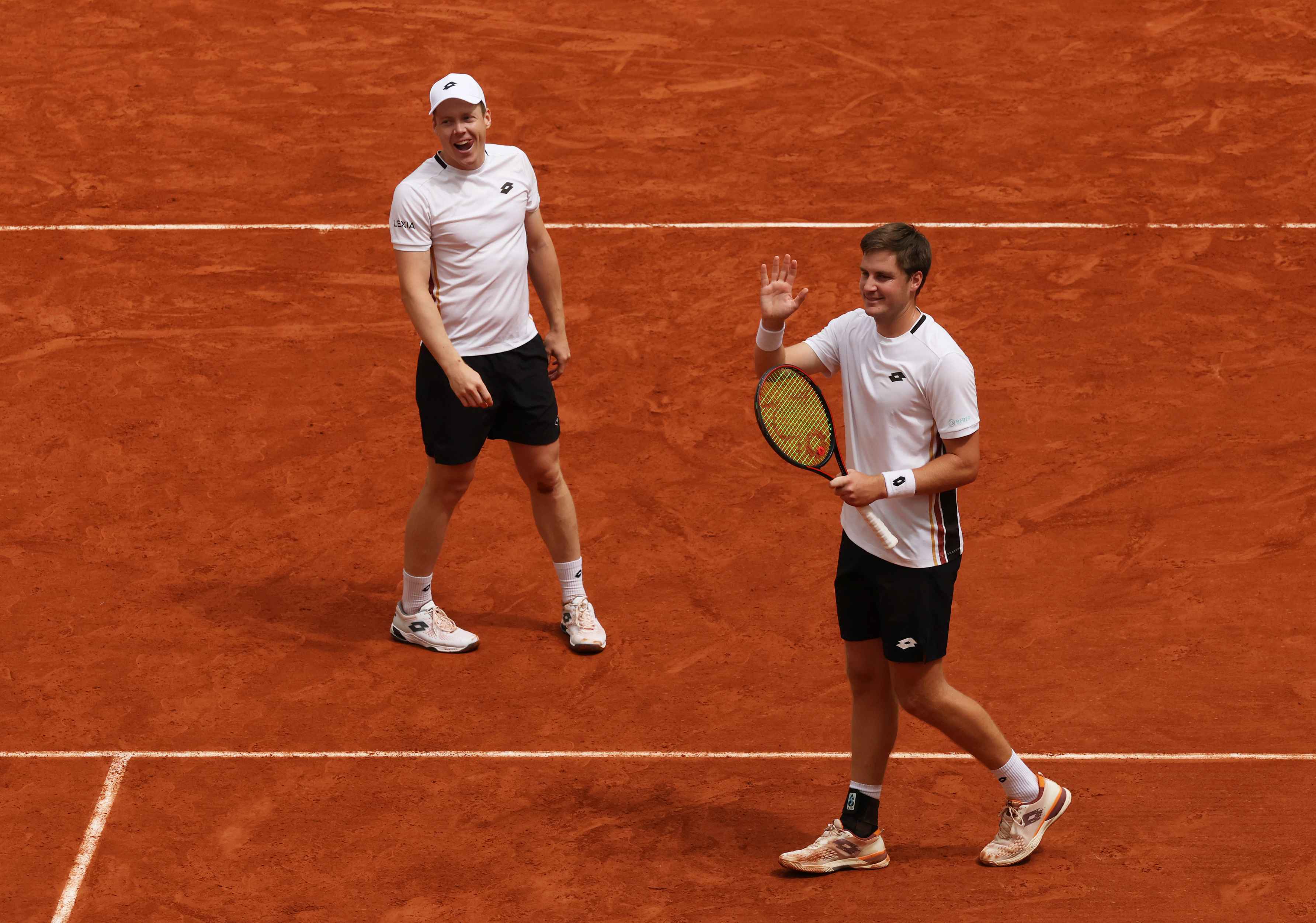 Henry Patten and Harri Heliovaara celebrate reaching the Roland Garros 2026 men's doubles final