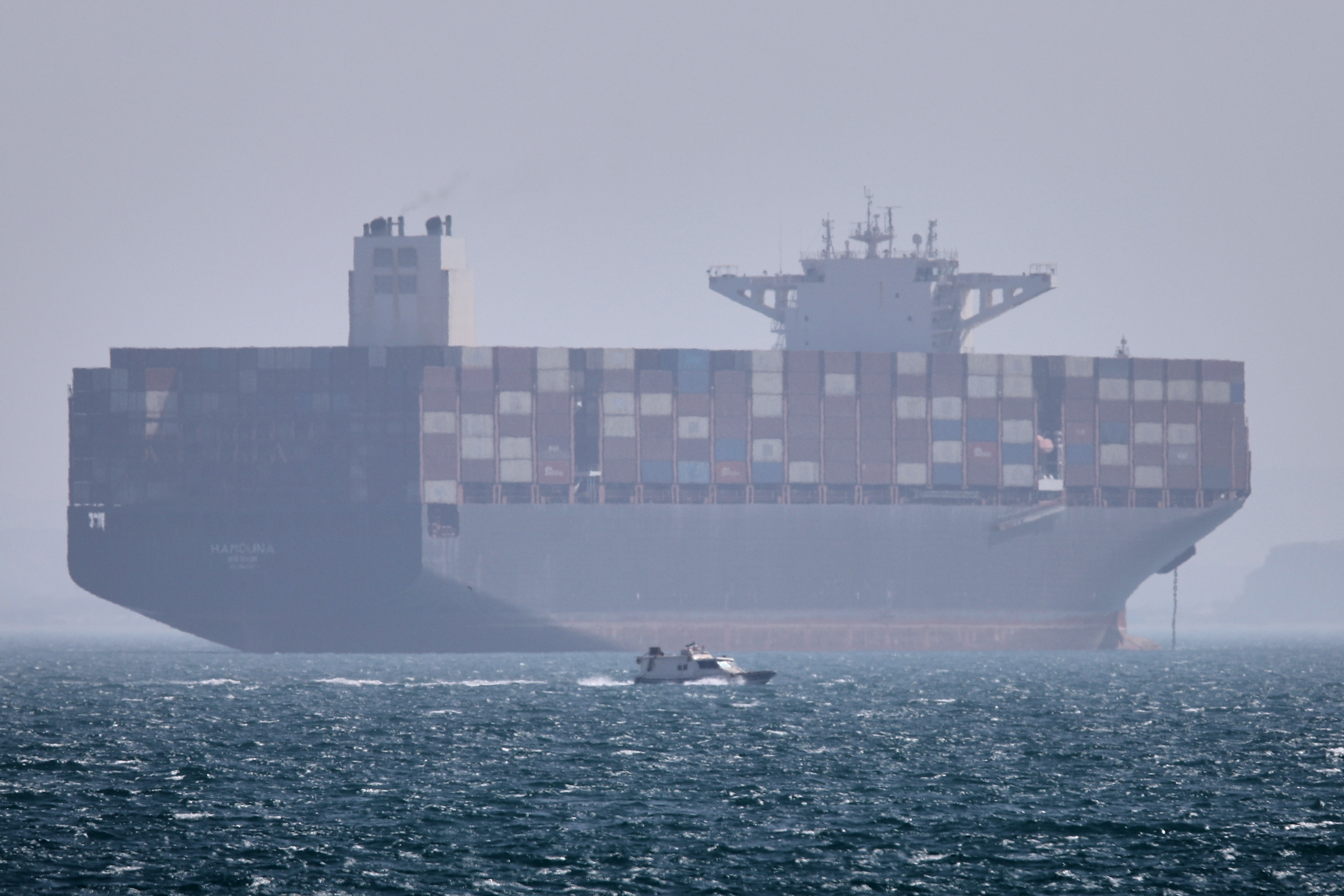 A container ship anchored in the Strait of Hormuz off Bandar Abbas, Iran