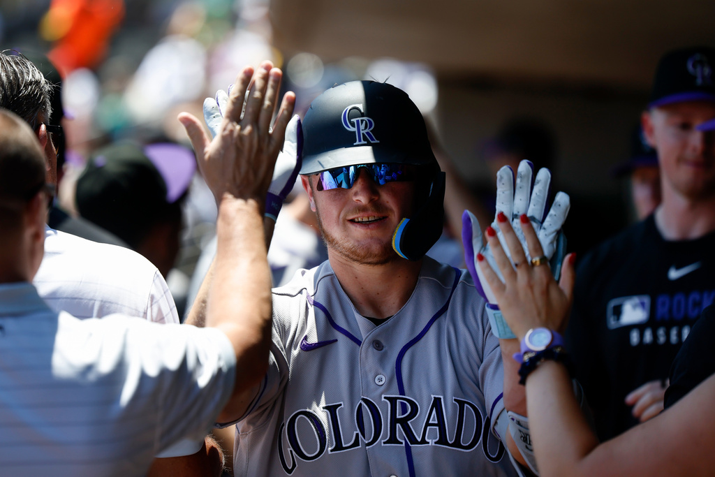 Hunter Goodman is greeted by teammates after his two-run home run against the Athletics at Las Vegas Ballpark June 14 2026