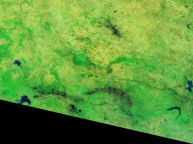NASA Landsat satellite image of a severely depleted reservoir in India before the monsoon