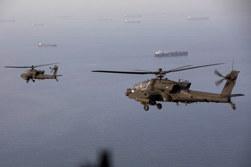 US military activity near the Strait of Hormuz as Iran and the US exchange strikes over the downed Apache helicopter
