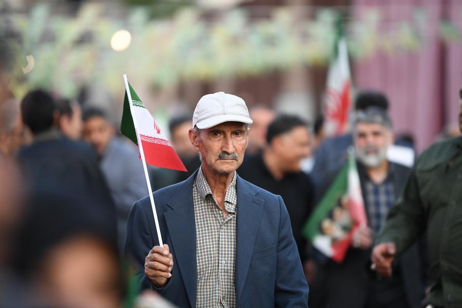 Iranians wave flags at Tehran rally pledging allegiance to Supreme Leader Mojtaba Khamenei amid Iran-US deal negotiations