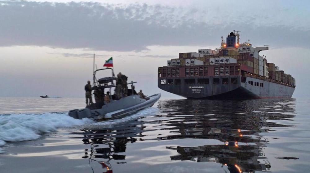 IRGC patrol boats coordinate passage of commercial vessels through the Strait of Hormuz