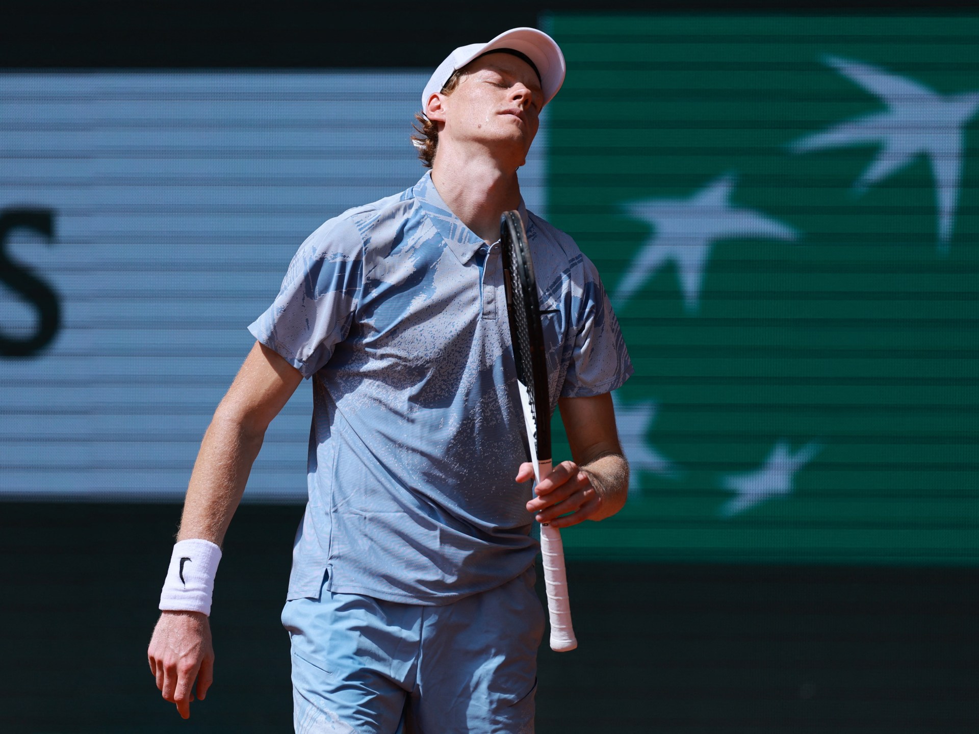 Jannik Sinner grimaces during his second-round exit at Roland Garros 2026