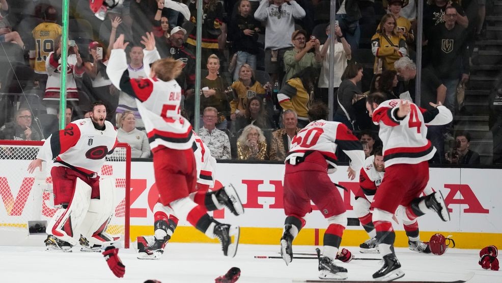 Jordan Staal holds the Conn Smythe Trophy on ice after Carolina Hurricanes win 2026 Stanley Cup over Vegas Golden Knights