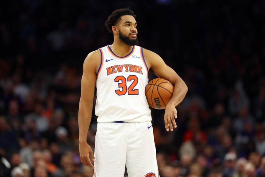Karl-Anthony Towns of the New York Knicks drives against the Phoenix Suns