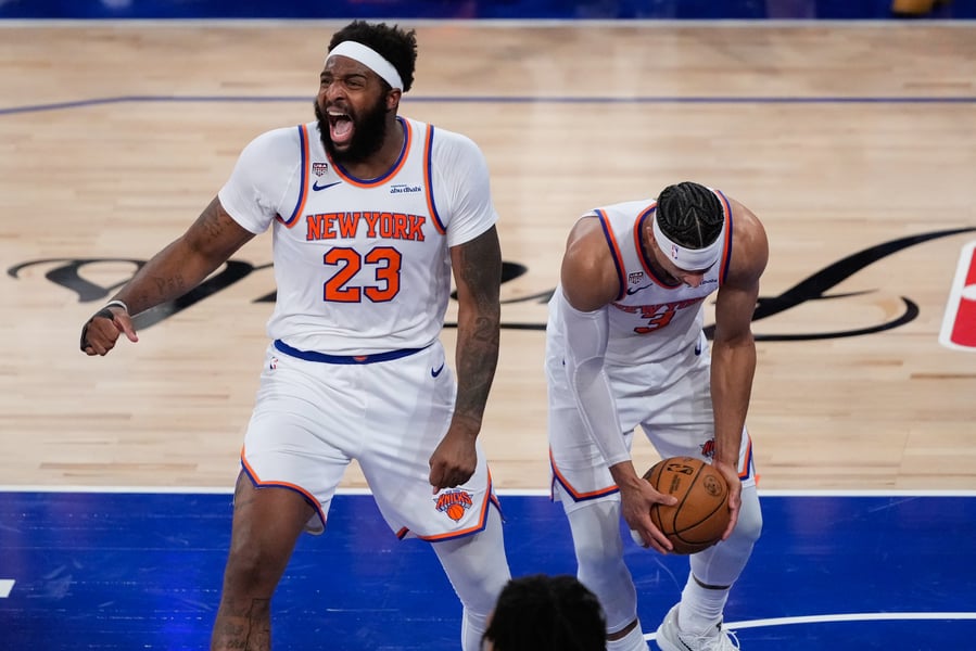 Mitchell Robinson and Josh Hart celebrate after the Knicks' record comeback win in Game 4 of the NBA Finals