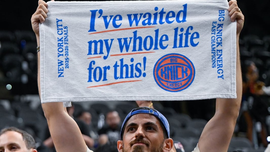 New York Knicks players celebrate on the court after winning the 2026 NBA championship over the San Antonio Spurs