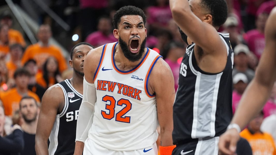 Karl-Anthony Towns of the New York Knicks leaves the court after Game 2 of the 2026 NBA Finals in San Antonio